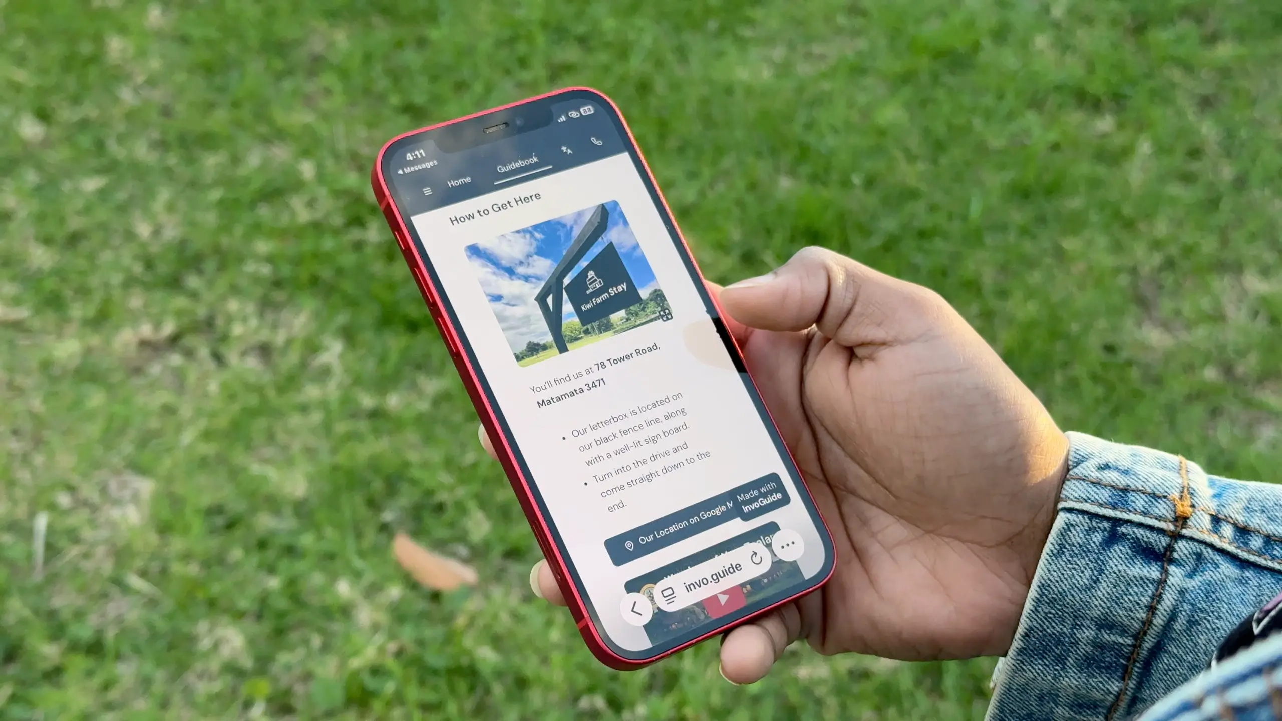 A host viewing a digital guest guidebook on a mobile phone